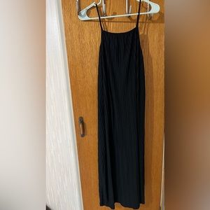 Black strap dress with slit on one side. Size large